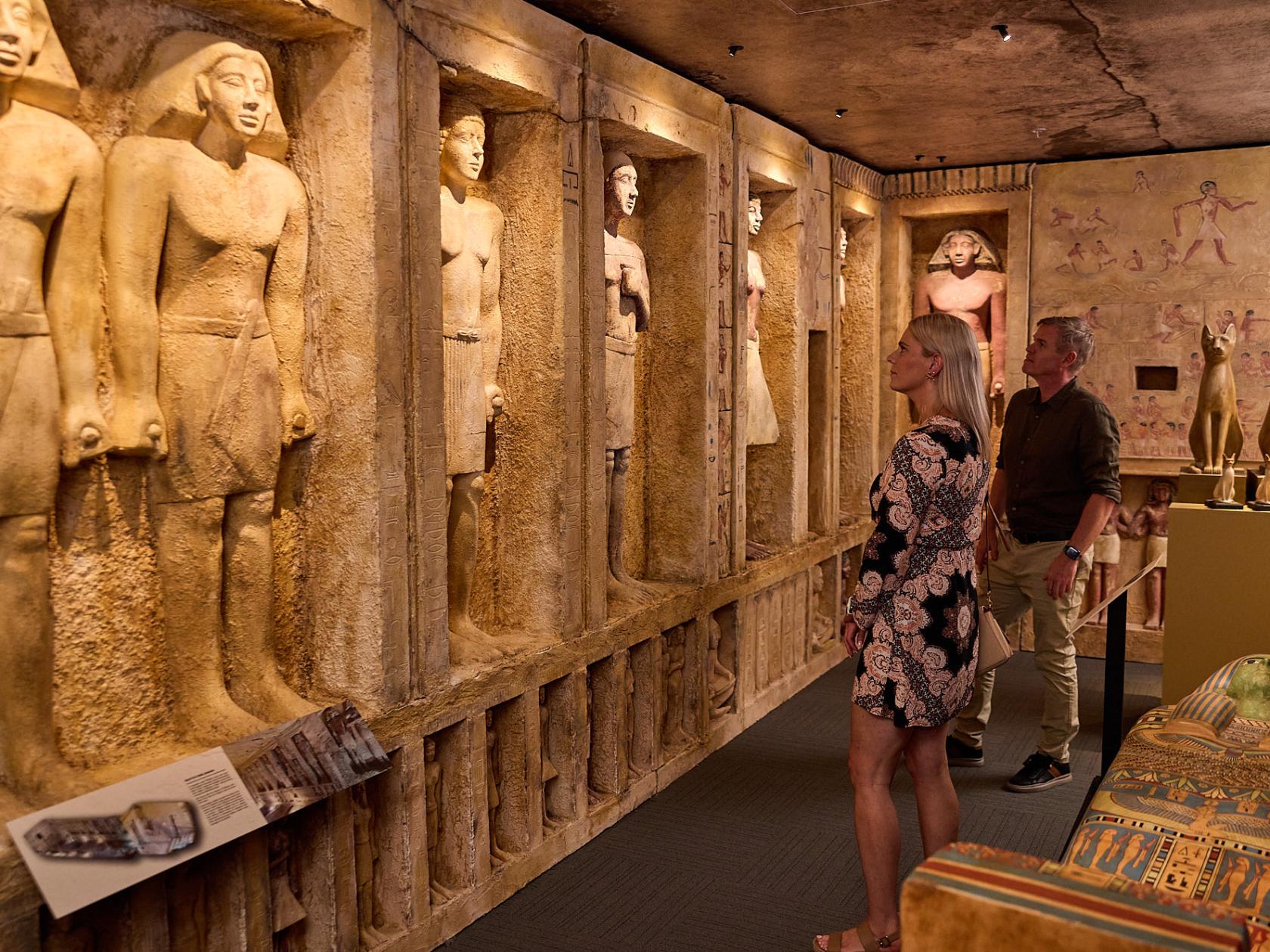 a man and a woman standing in a room